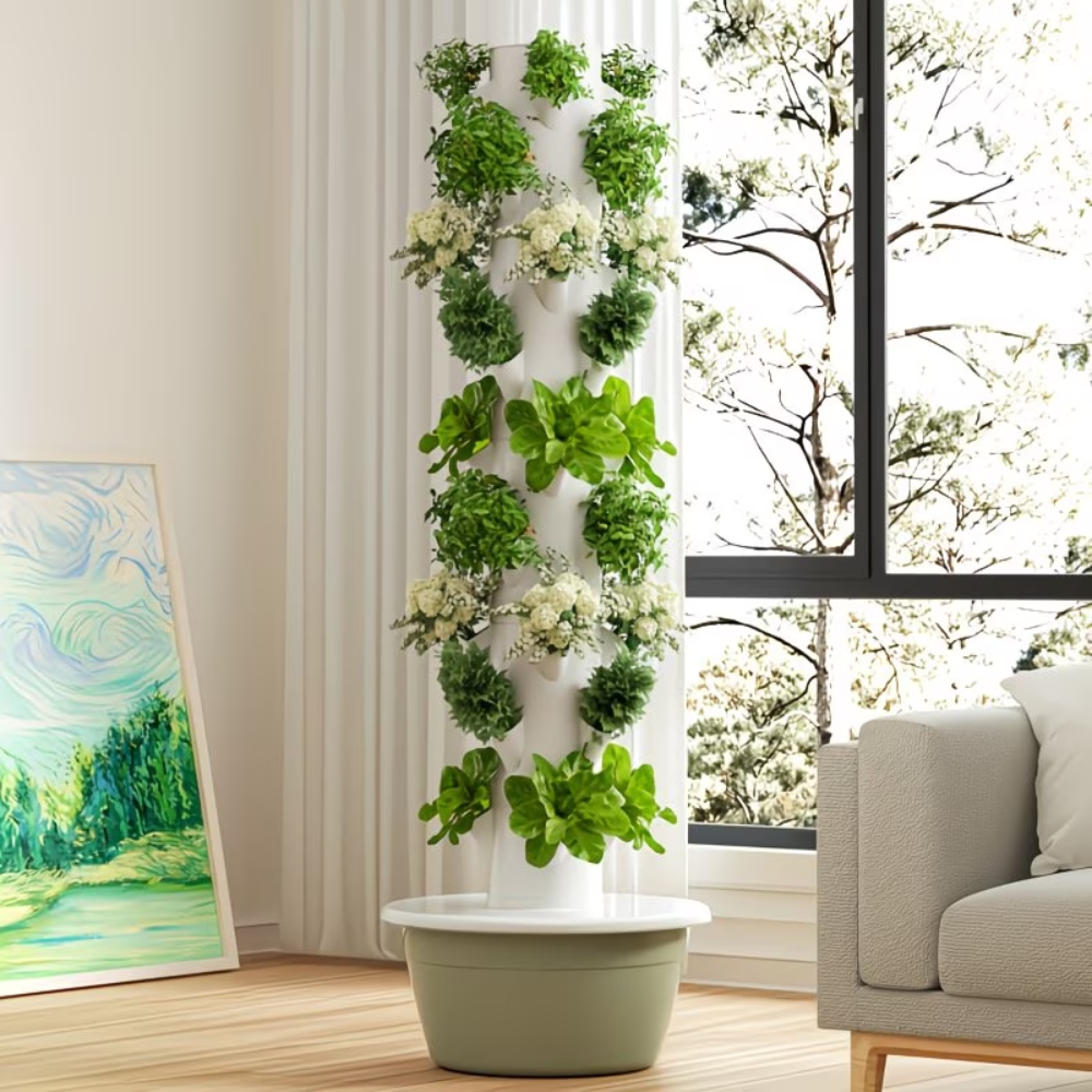 Tour de culture hydroponique à bac vert installée dans un salon lumineux avec salades et aromates