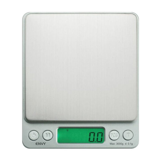 Balance de précision On Balance Envy 3000 g, plateau inox et écran vert vus de face