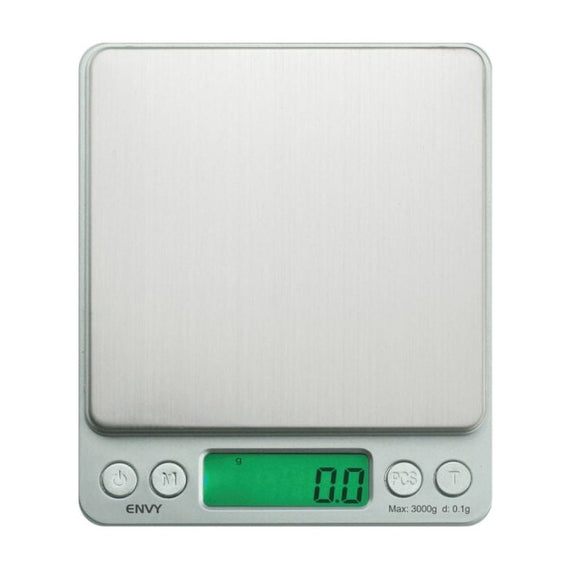 Balance de précision On Balance Envy 3000 g, plateau inox et écran vert vus de face